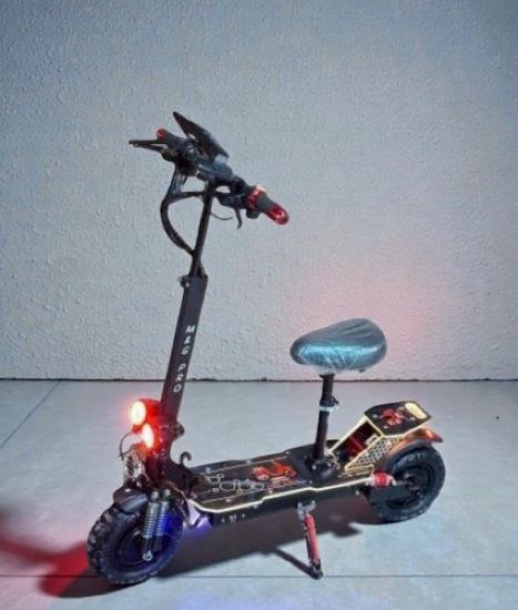 صورة سكوتر الوحش محركين X15 ببطاريه 48 فولت 3000 واط